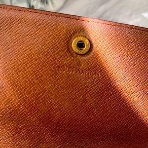 Louis Vuitton wallet-estate sale items used in a film as props are now for sale—